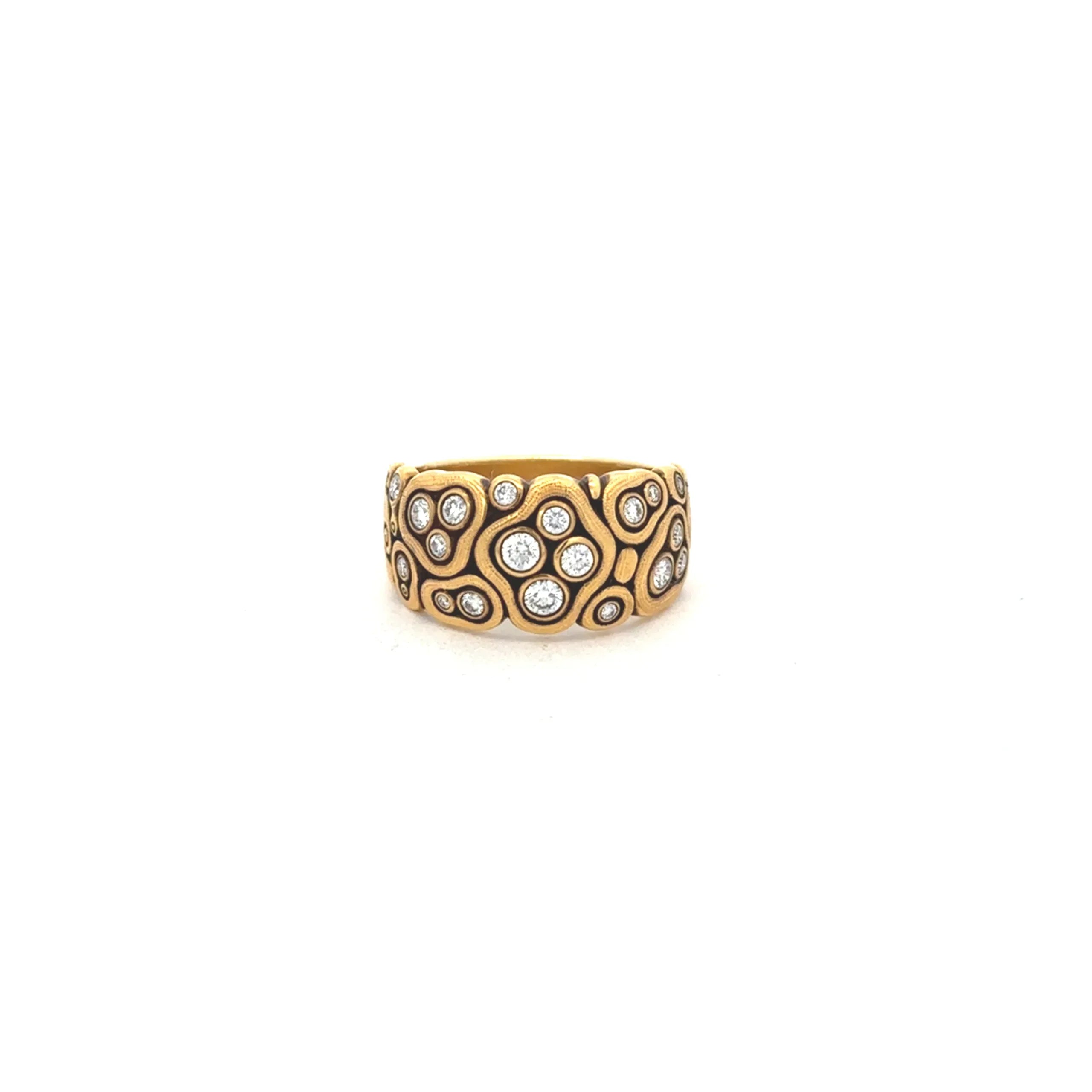 Yellow gold and diamond ring on a white background
