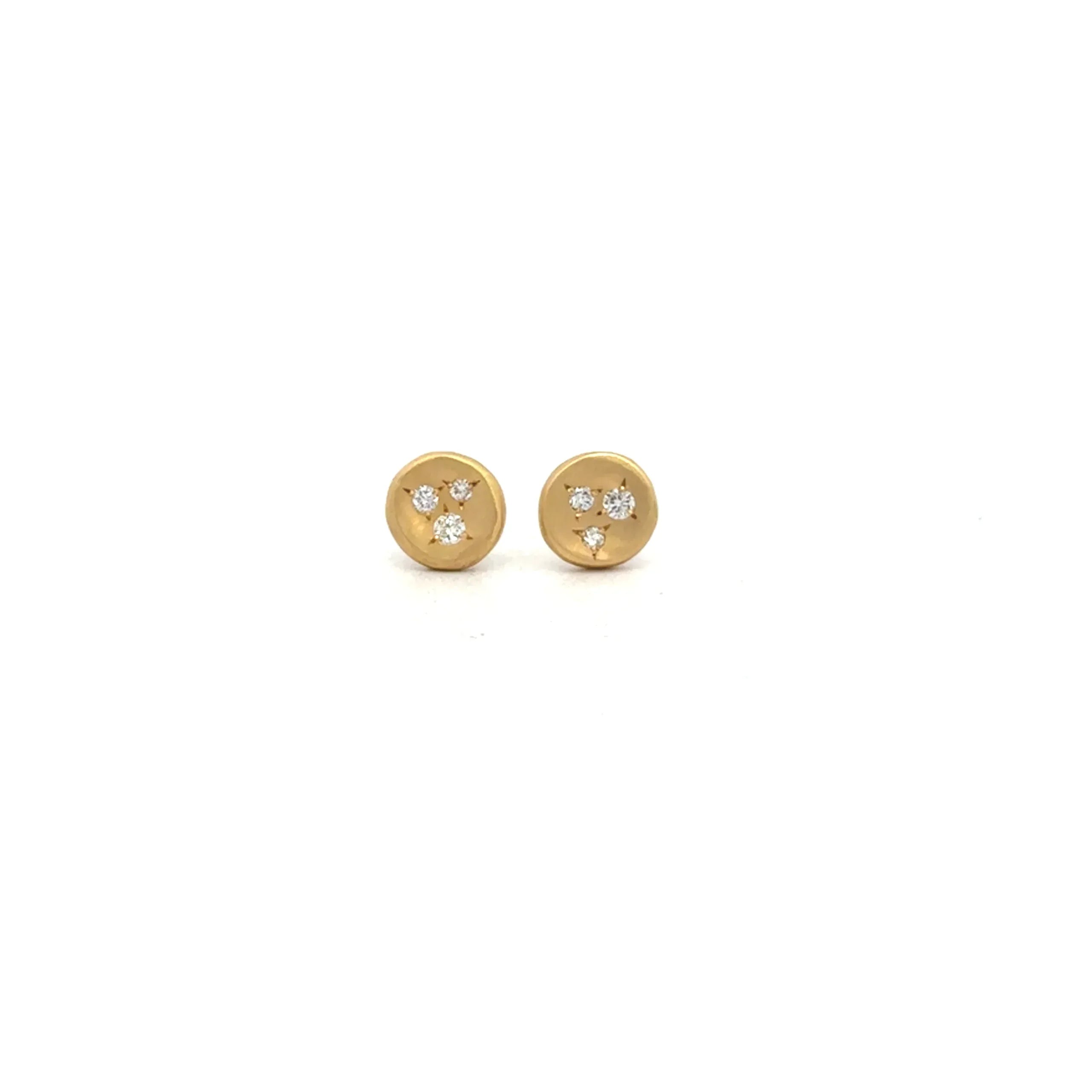 A pair of Ali Dumont Everyday Diamond Scatter Studs in 18 karat yellow gold, each with three clear diamonds, shown against a plain white background.