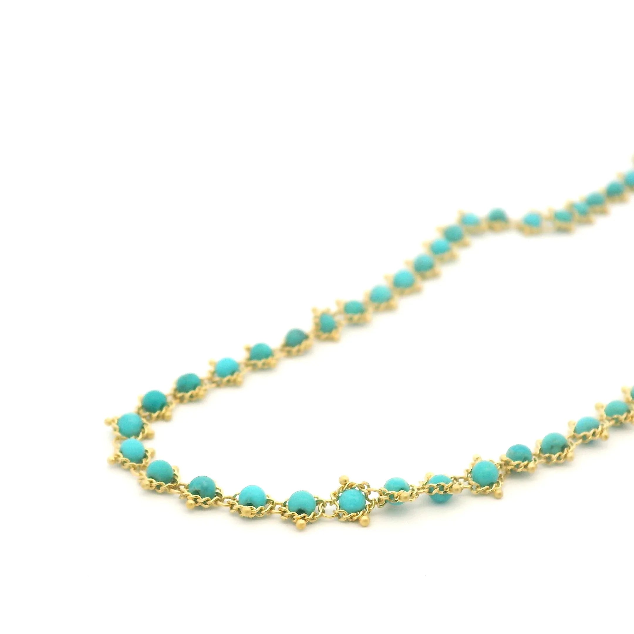 Yellow gold and turquoise station necklace