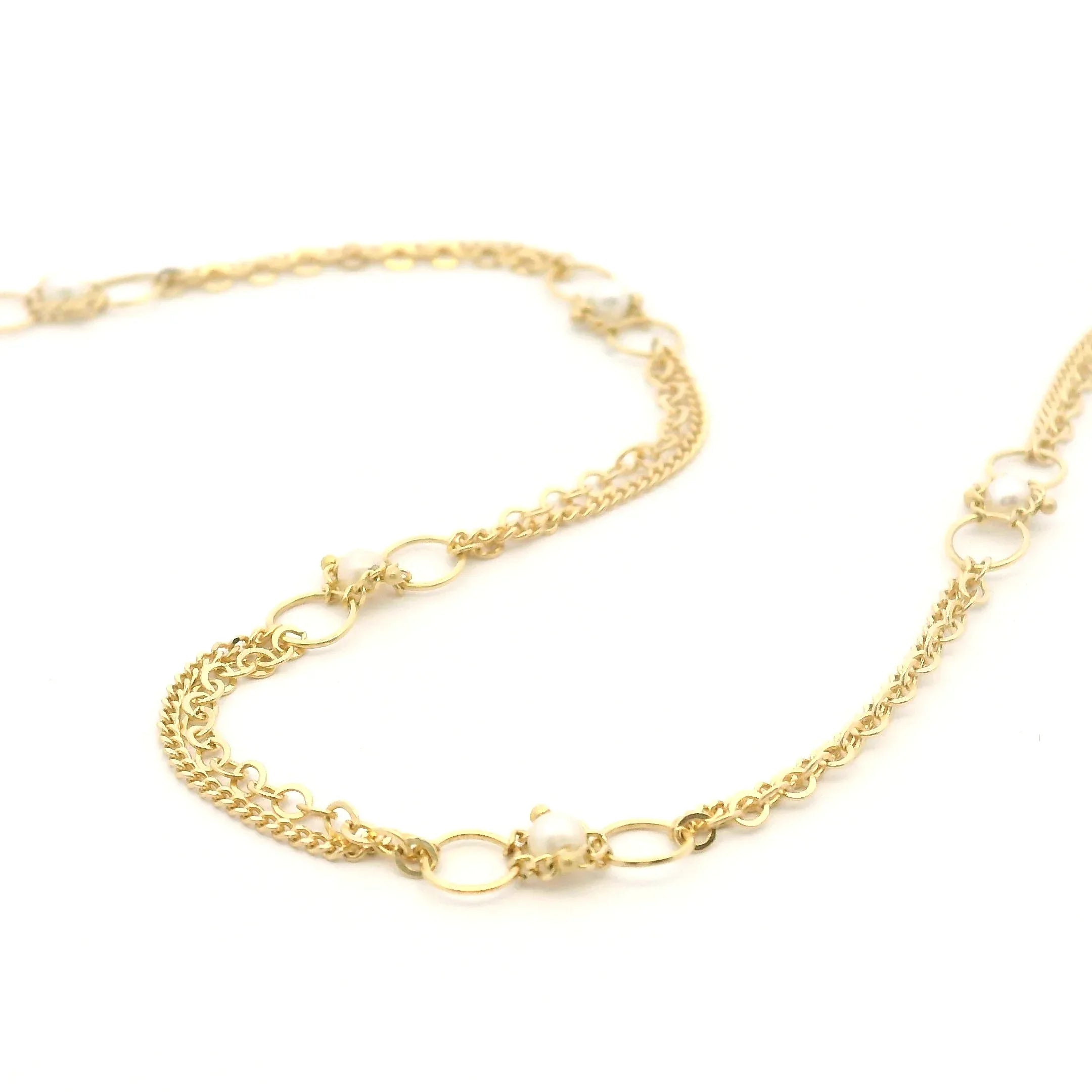 Yellow gold and pearl station necklace