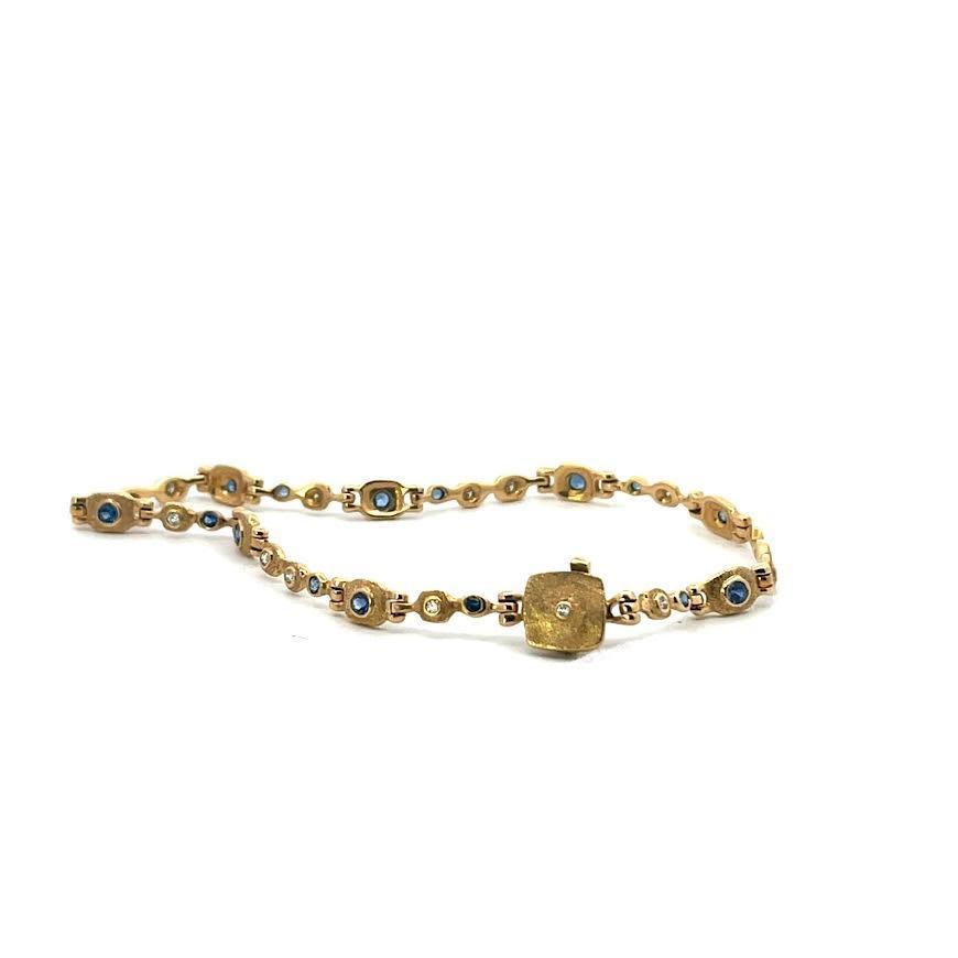 18 karat Yellow Gold, Diamond and Sapphire Hinge Bracelet