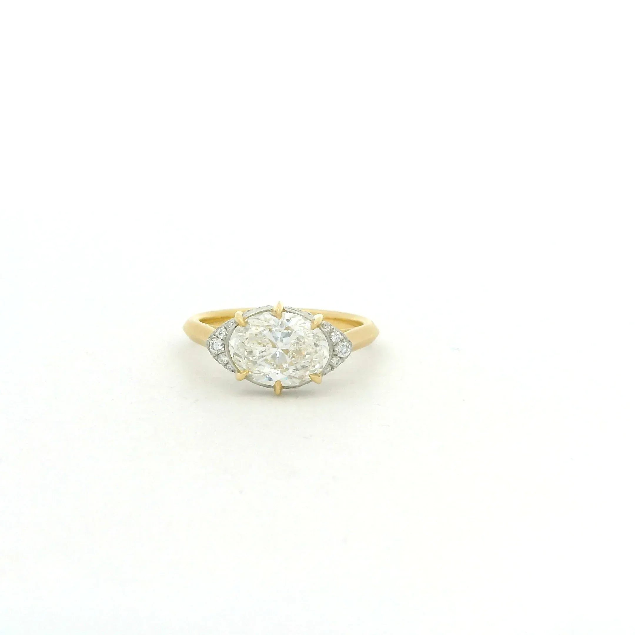 Yellow Gold and Oval Diamond Ring
