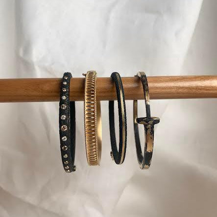 18 karat Yellow Gold "Rays" Bangle