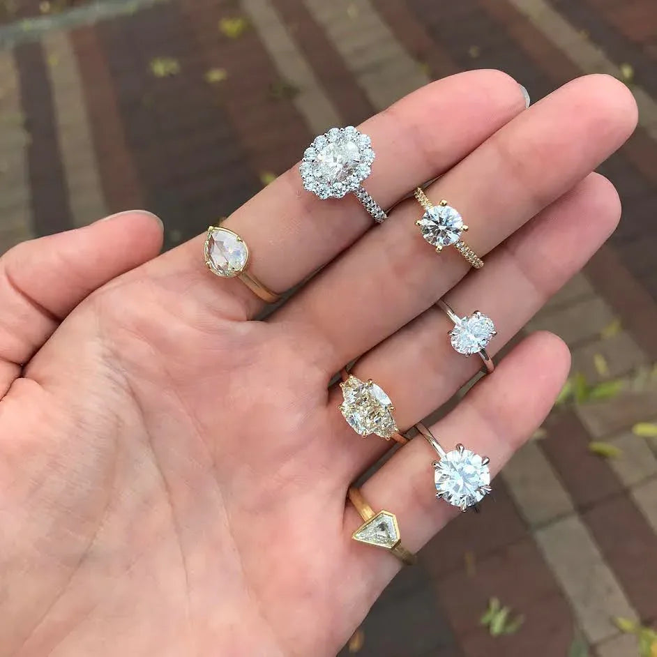 Hand holding multiple finished rings