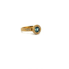 18 karat Yellow Gold, Montana Sapphire and Diamond Halo Ring