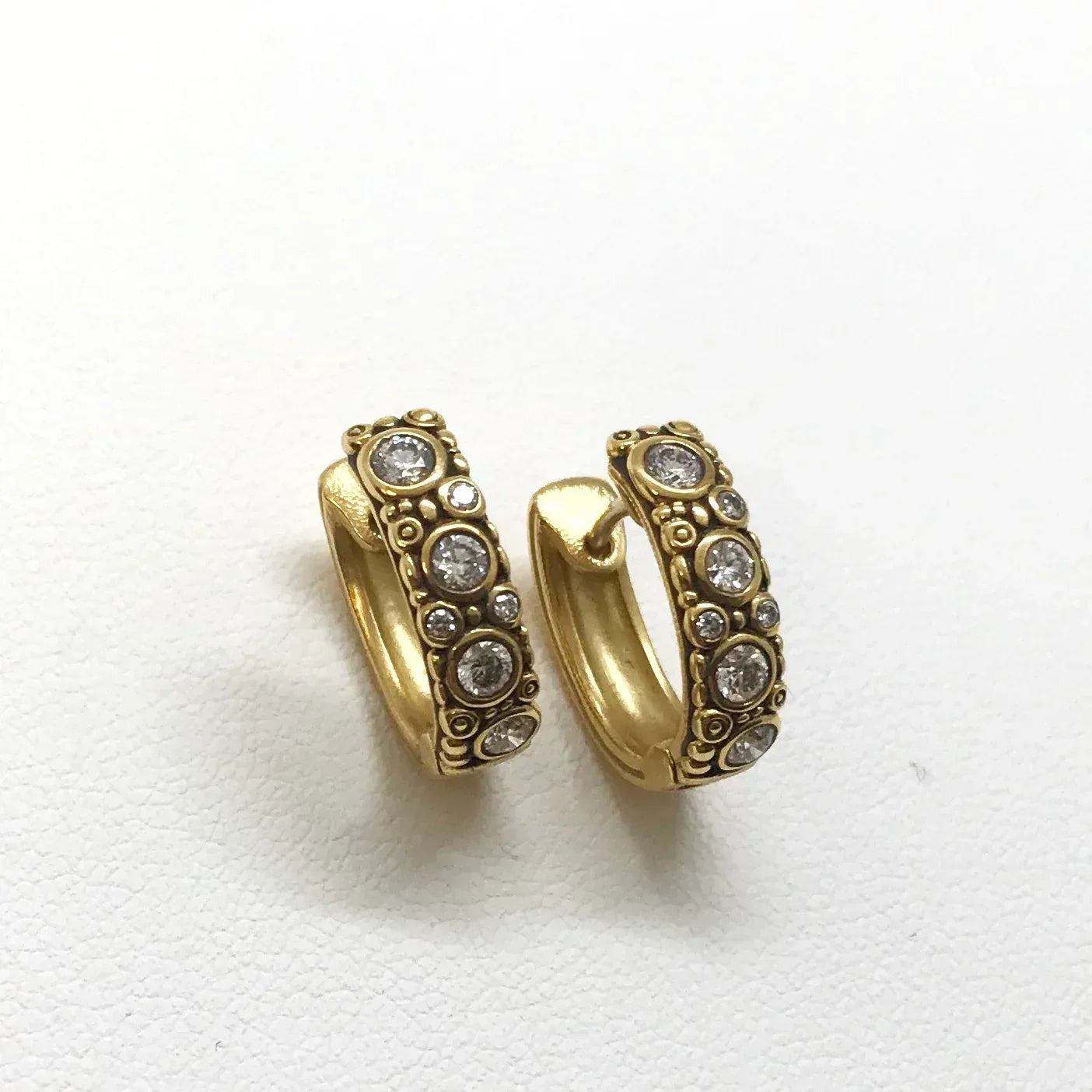 Oval Diamond Huggie Earrings