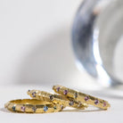 18 karat Yellow Gold and Diamond Notch Band