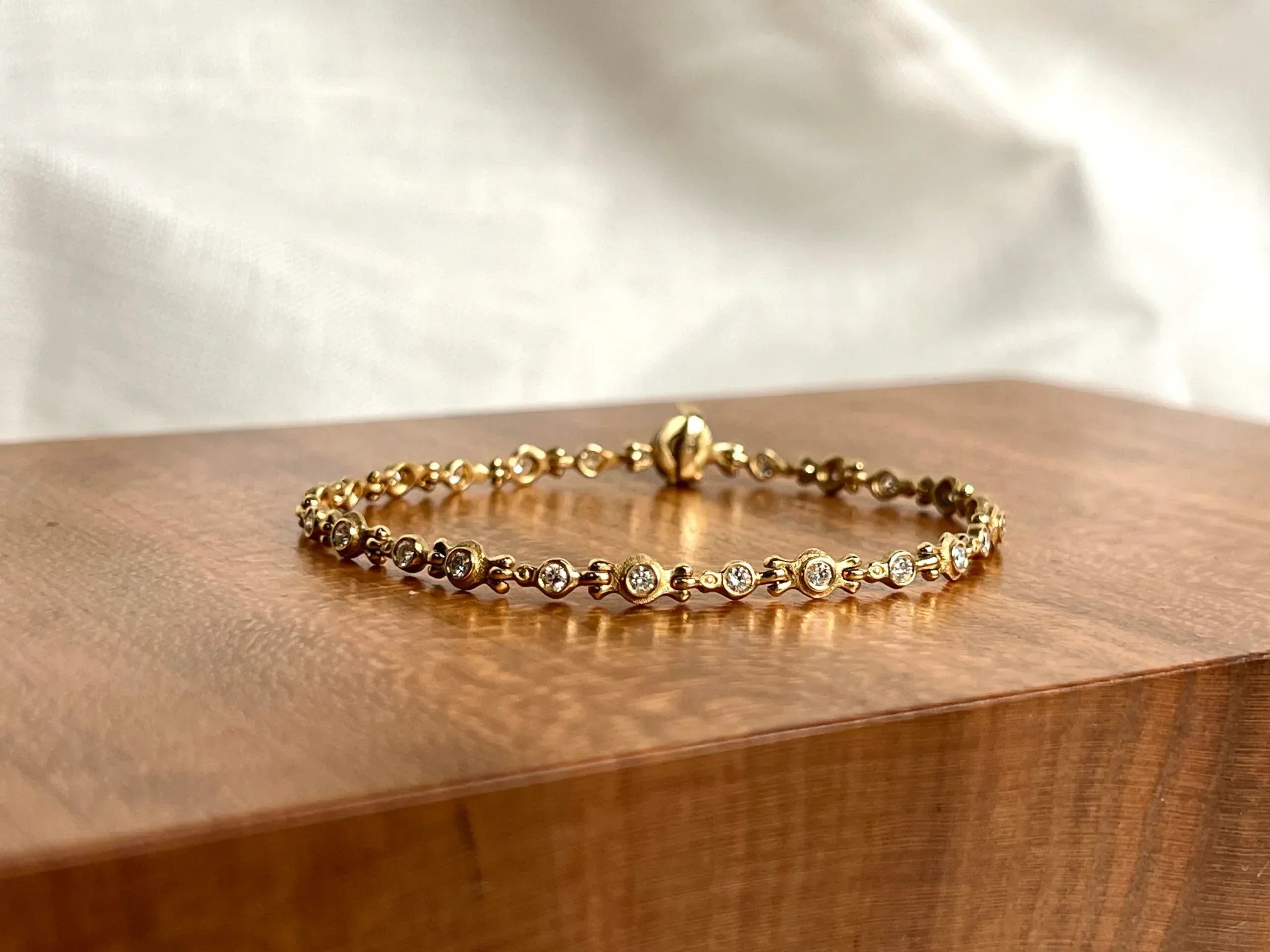 Yellow gold Hinged Diamond Bezel Bracelet