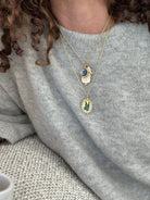 14 Karat Yellow Gold Tiny Feather Charm