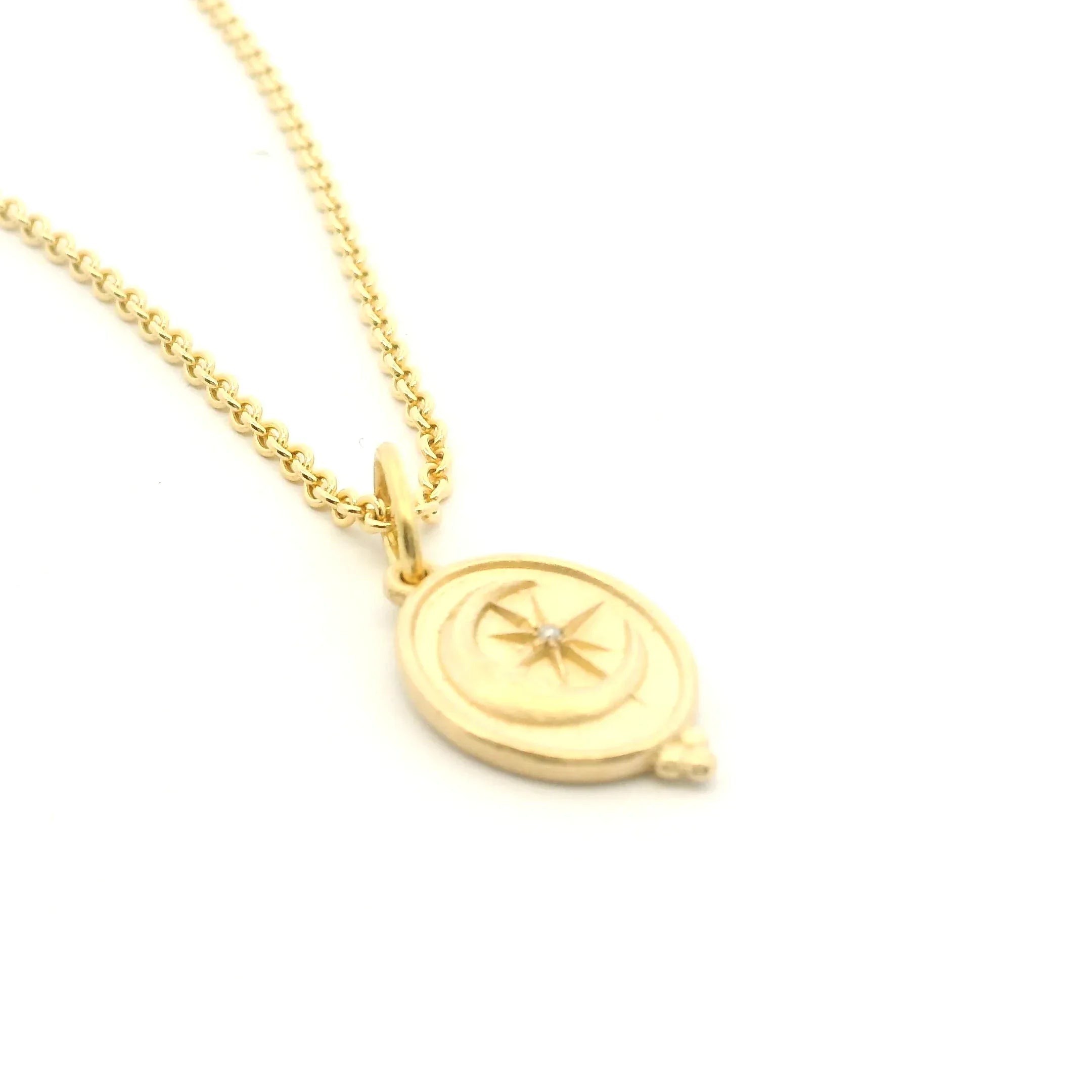 14 Karat Yellow Gold Oval Man In The Moon Charm