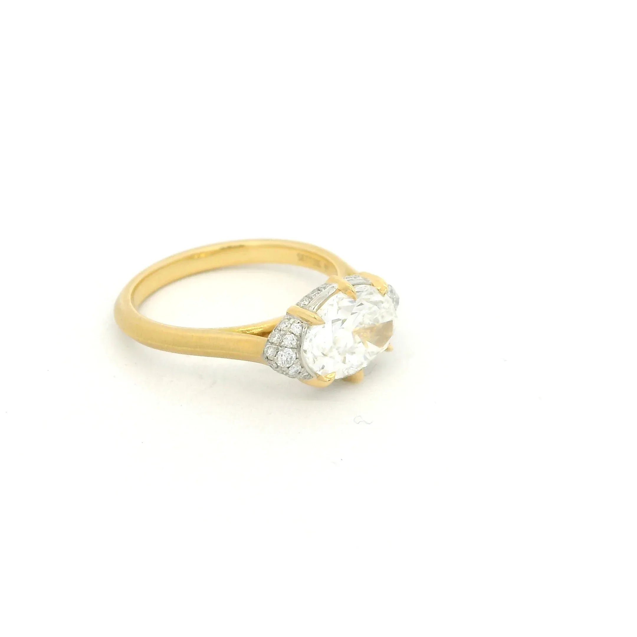 Yellow Gold and Oval Diamond Ring