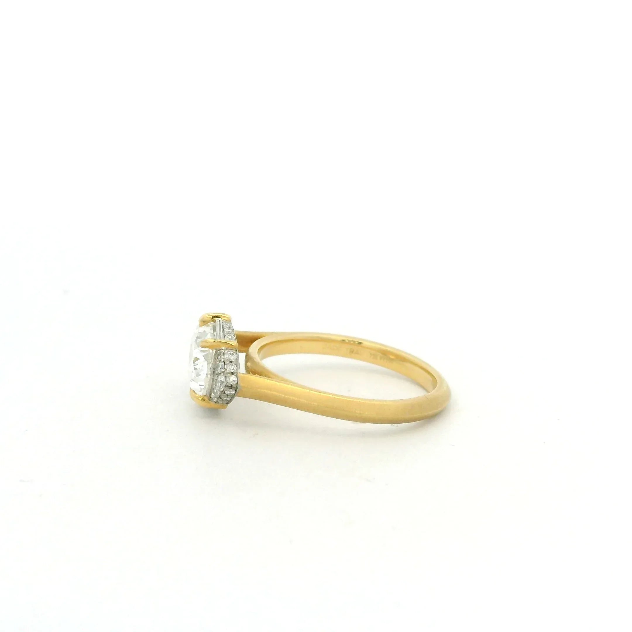 Yellow Gold and Oval Diamond Ring
