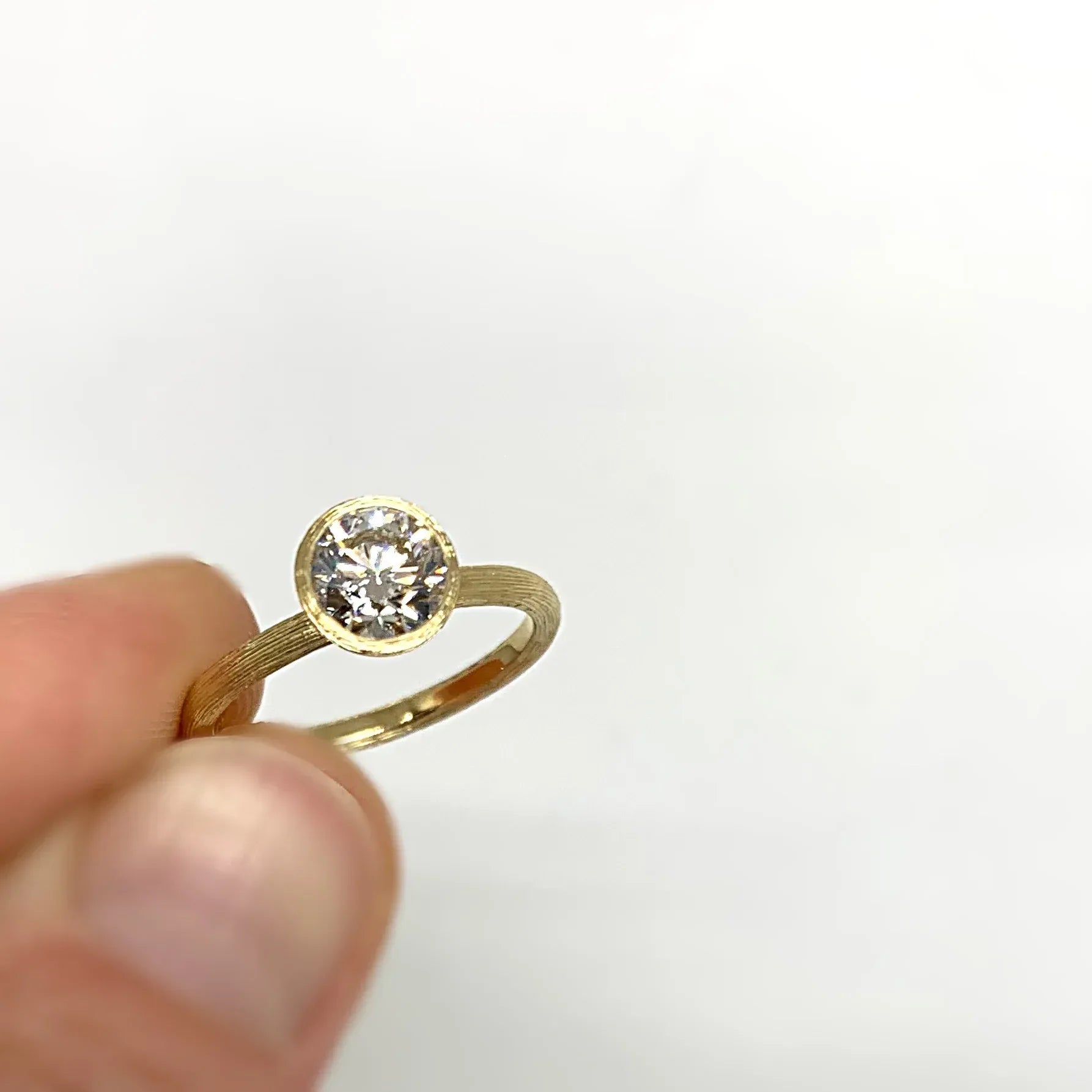 Yellow Gold Bezel Set Solitaire