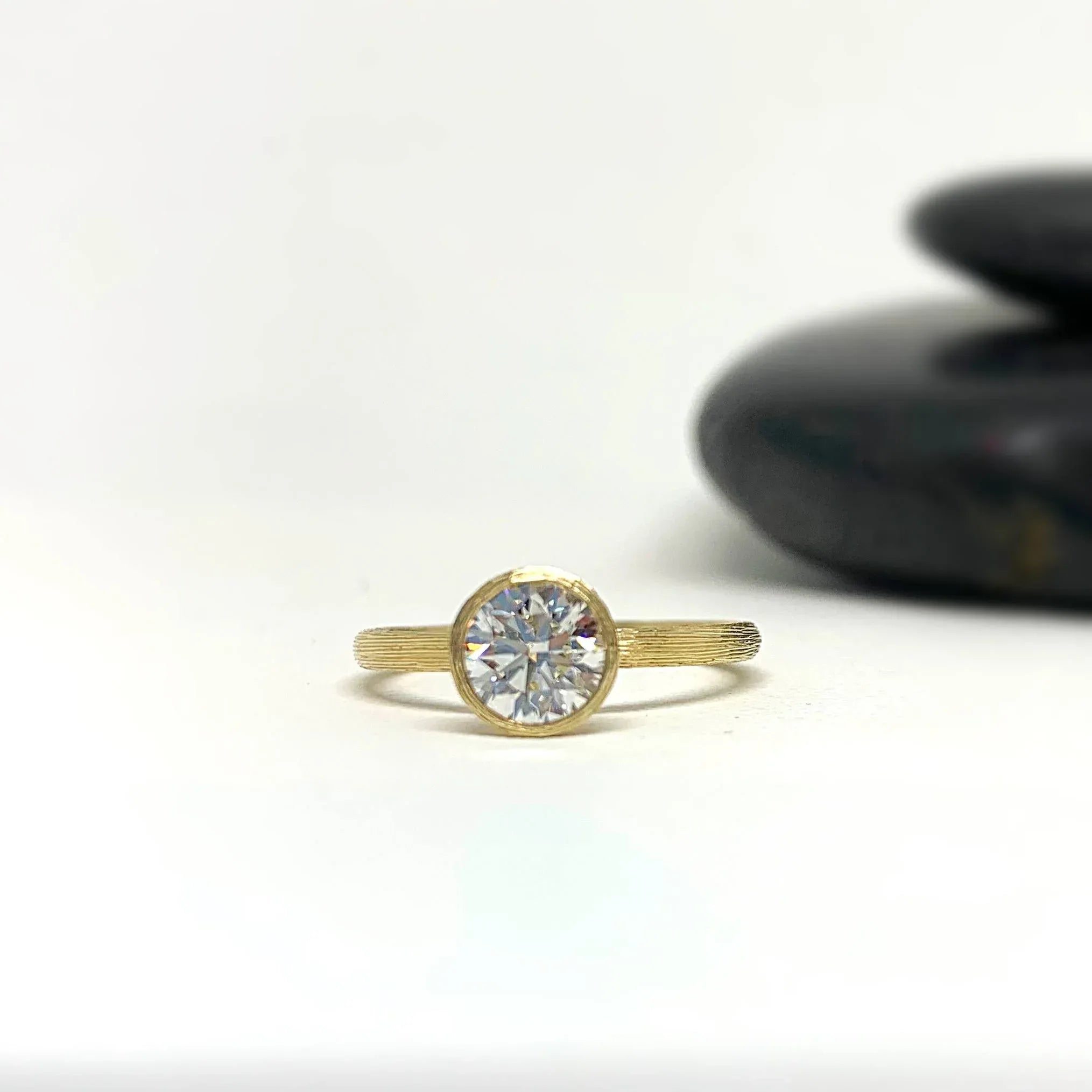 Yellow Gold Bezel Set Solitaire