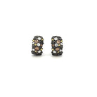 The Multi-Color Diamond Confetti Huggie earrings feature small black rhodium plated white gold hoops, adorned with clusters of sparkling white, brown, and yellow diamonds against a plain white background.