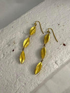 Yellow Gold Triple Drop Cylinder Earrings
