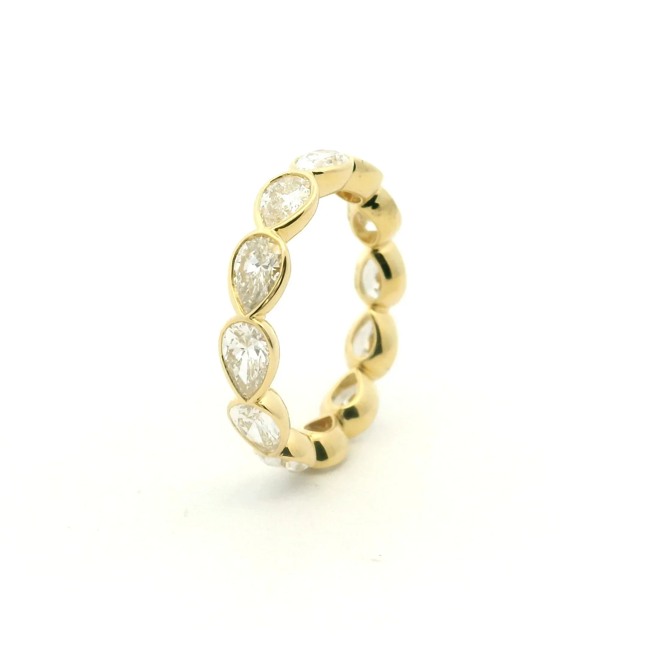 18 Karat Yellow Gold Pear Shape Diamond Eternity Band