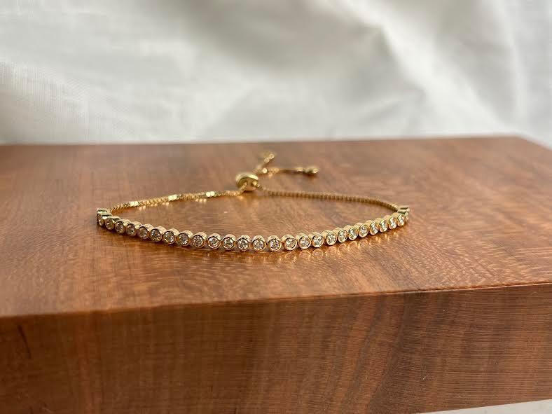 18 karat Yellow Gold and Diamond Bezel Cinch Bracelet