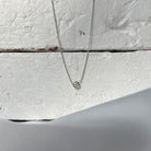 18 karat White Gold and Diamond Necklace, 0.20 CT