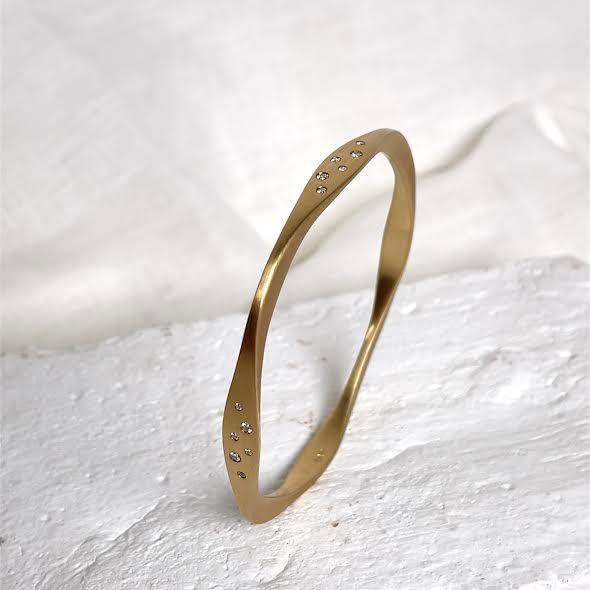18 karat Yellow Gold and Scattered Diamond Bangle, 0.37 CT