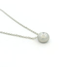 Platinum and Diamond Bezel Pendant