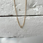 18 karat Yellow Gold and Diamond Necklace, 0.20 CT