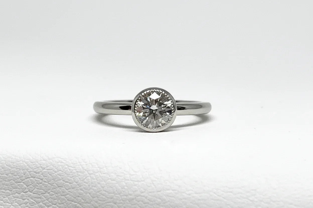 Platinum and Diamond Bezel-Set Engagement Ring