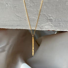 18 karat Yellow Gold and Diamond Hammered Bar Pendant