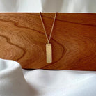 18 karat Yellow Gold and Diamond Hammered Bar Pendant