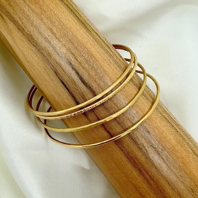 18 karat Yellow Gold Hammered Bangle, Polished