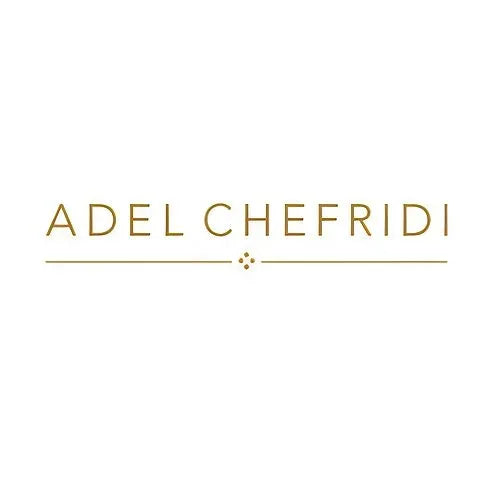 Gold Adel Chefridi logo on a white background