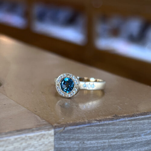 Yellow Gold Sapphire and Diamond Halo Ring