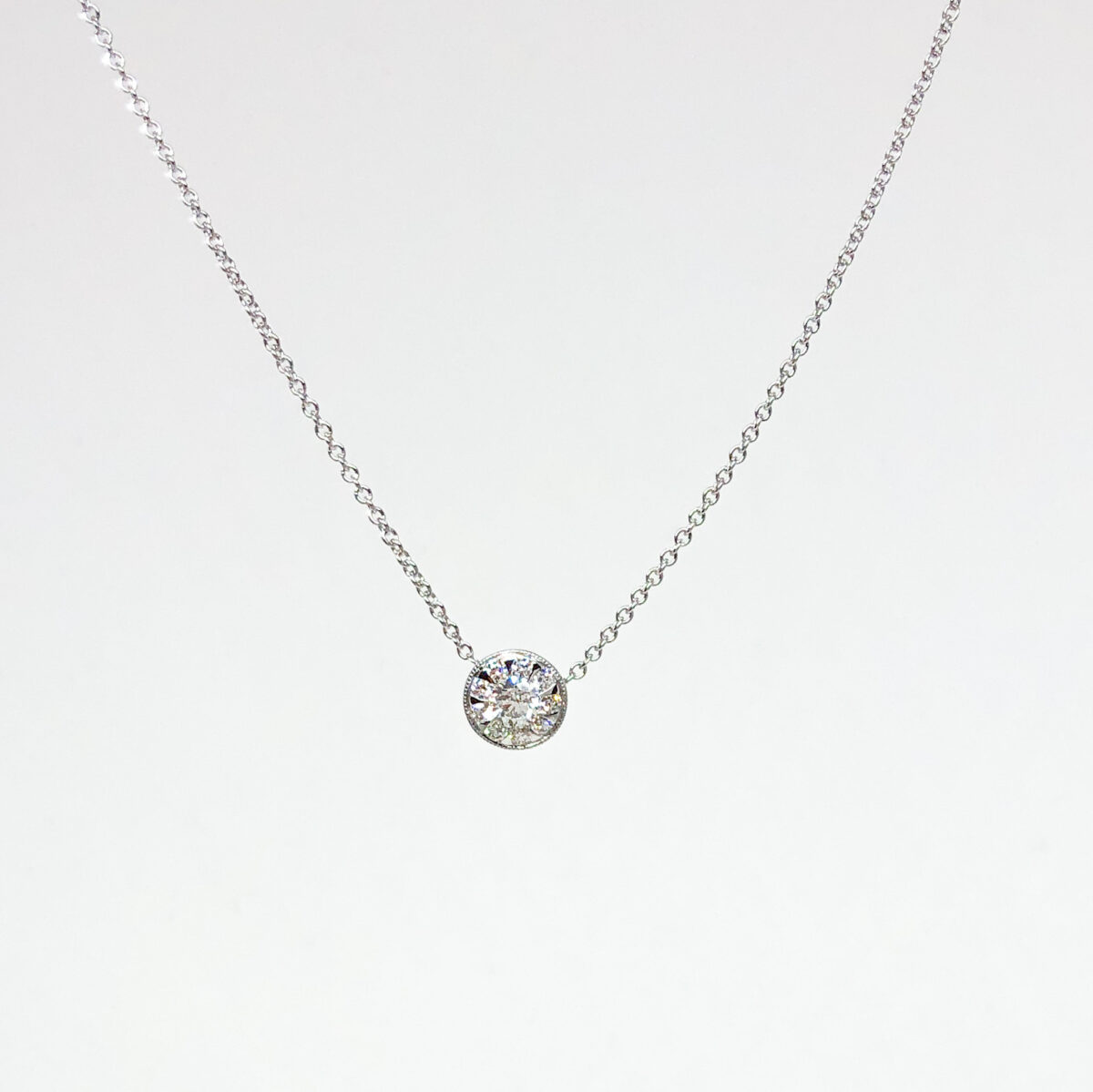 White Gold and Sunburst Diamond Necklace