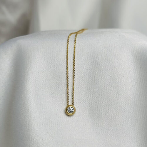 18 karat yellow gold and diamond 'Mini' bezel pendant