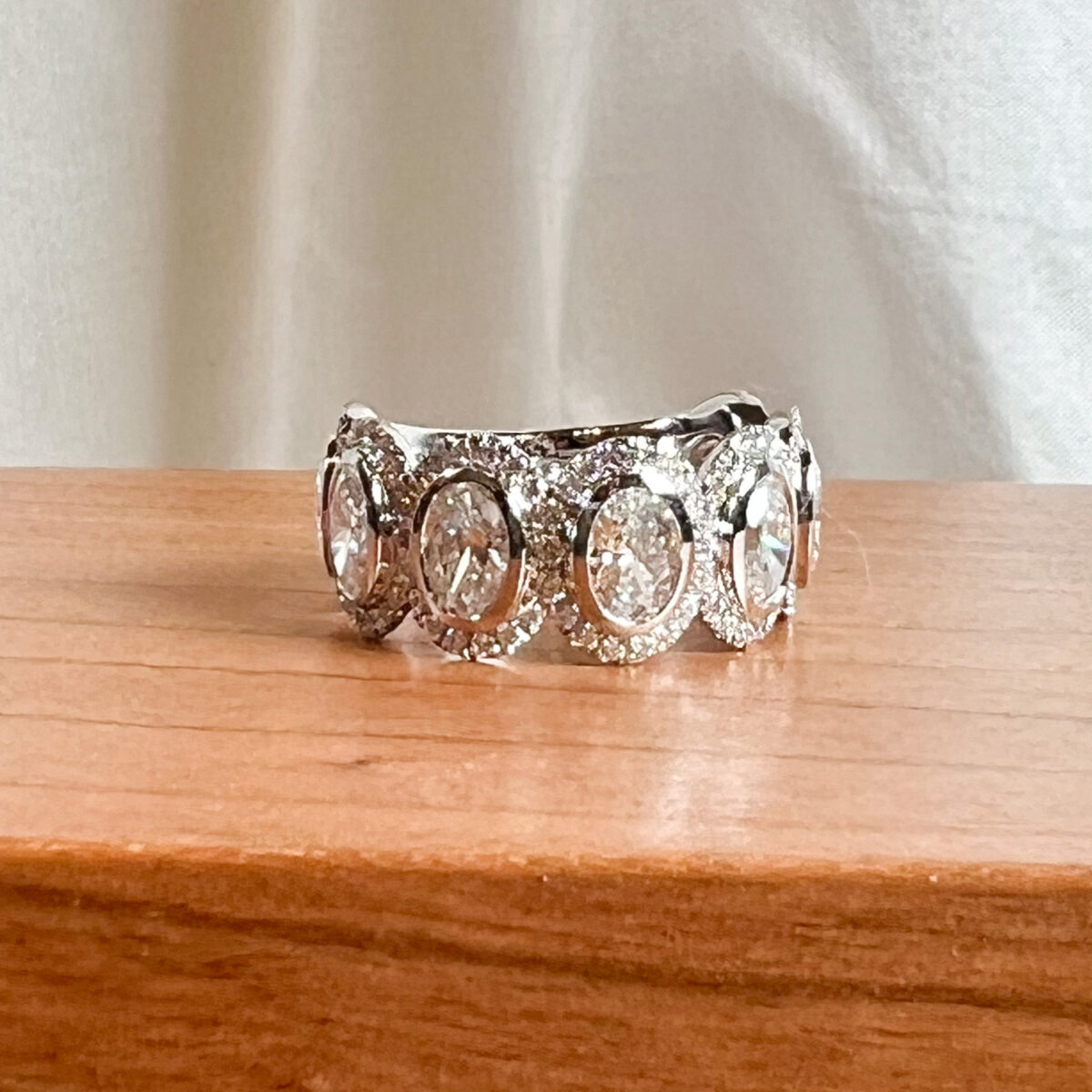 White Gold Oval Diamonds Halo Band