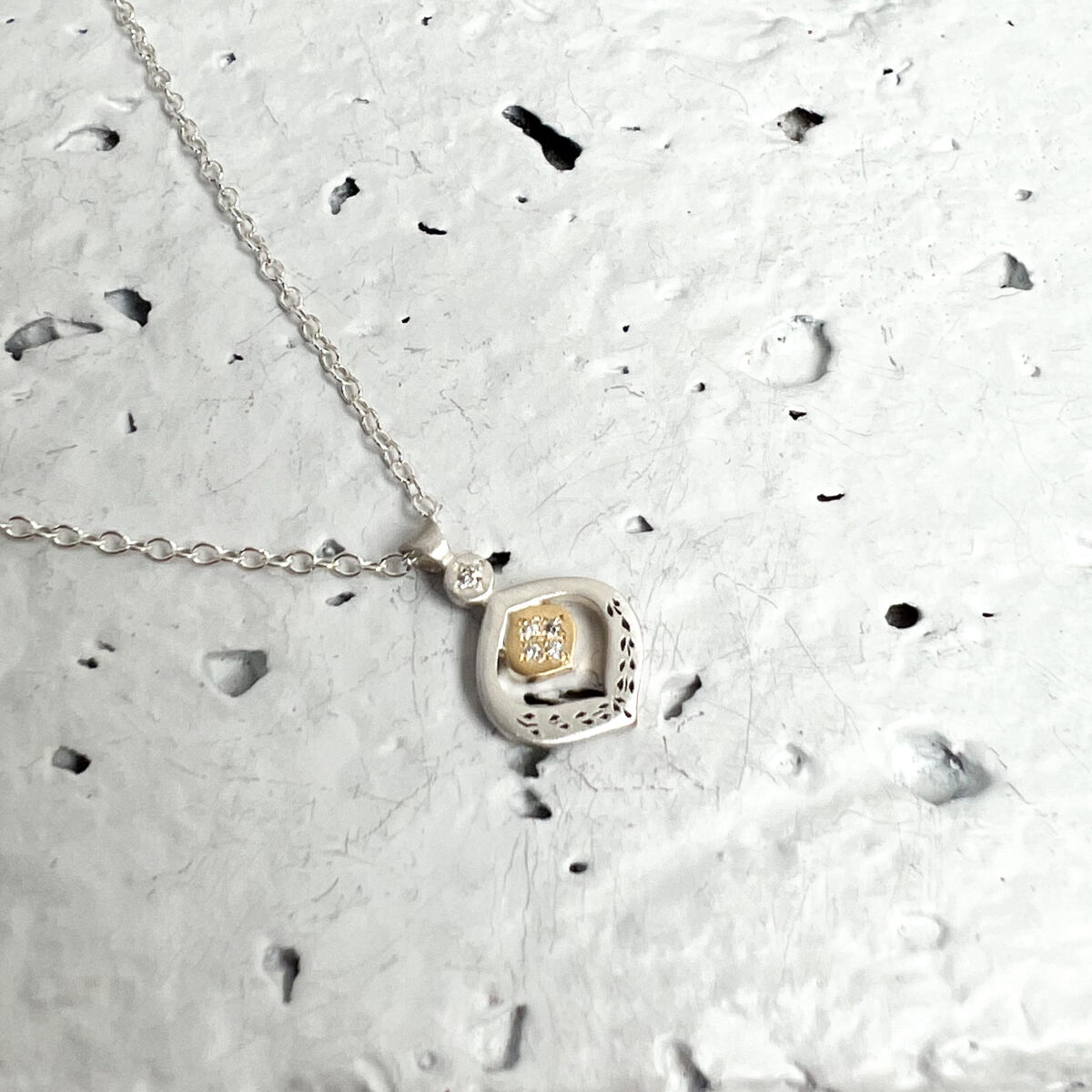 Sterling, Gold and Diamond Nest Pendant