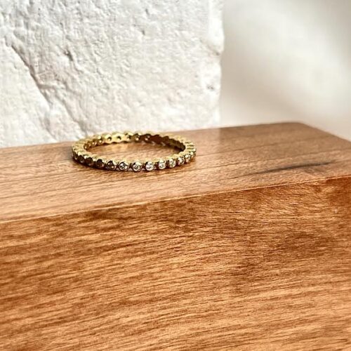 18 karat Yellow Gold and Diamond Bezel Eternity Band