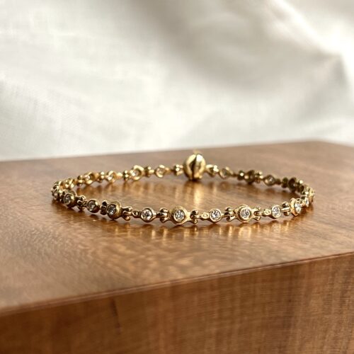 Yellow gold Hinged Diamond Bezel Bracelet