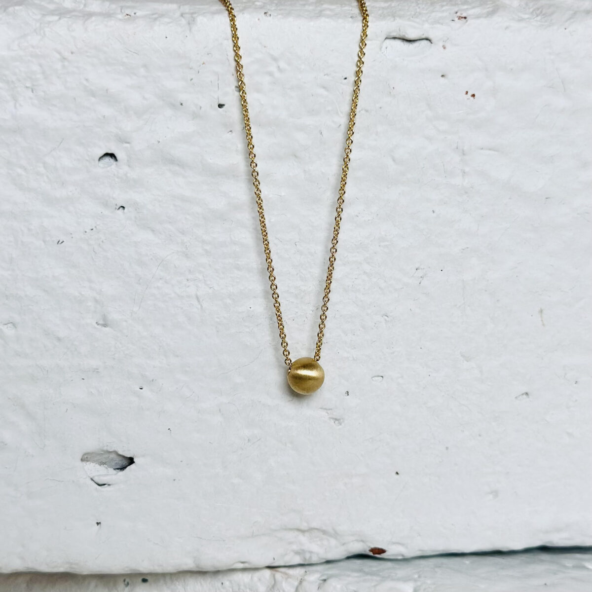 Gold Sphere Pendant