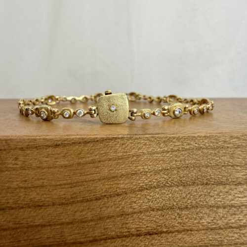 18 karat Yellow Gold and Diamond Hinged Bracelet