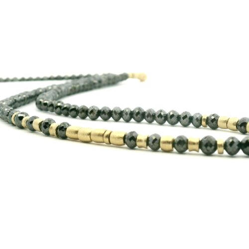 Faceted Black Diamond and gold strand