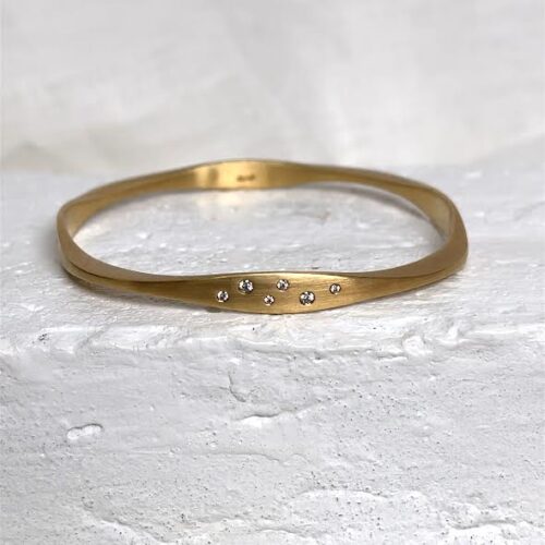 18 karat Yellow Gold and Scattered Diamond Bangle, 0.37 CT