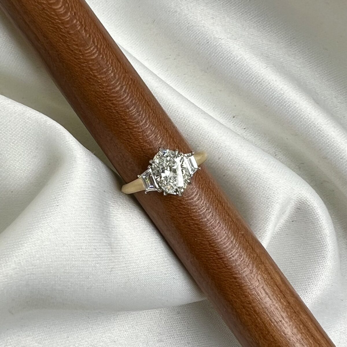 Yellow Gold and Oval Diamond Three Stone Ring