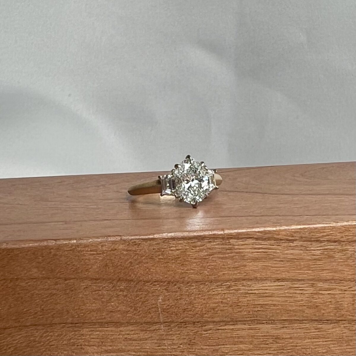 Yellow Gold and Oval Diamond Three Stone Ring