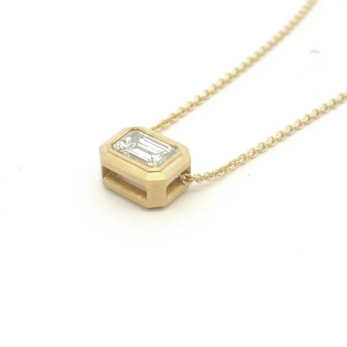 Yellow Gold Bezel Set Emerald Cut Diamond Pendant