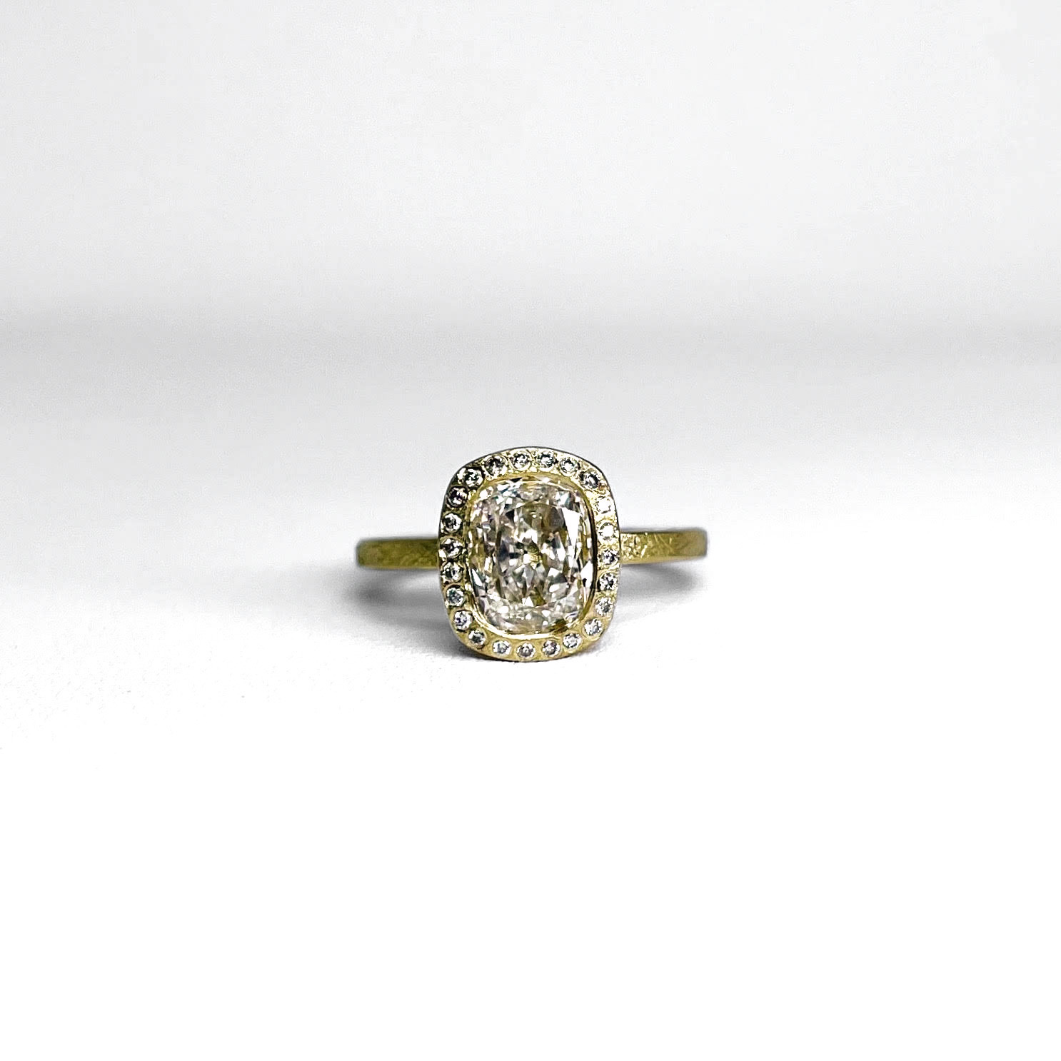 1.5 Cushion Cut Bezel Set Diamond Ring