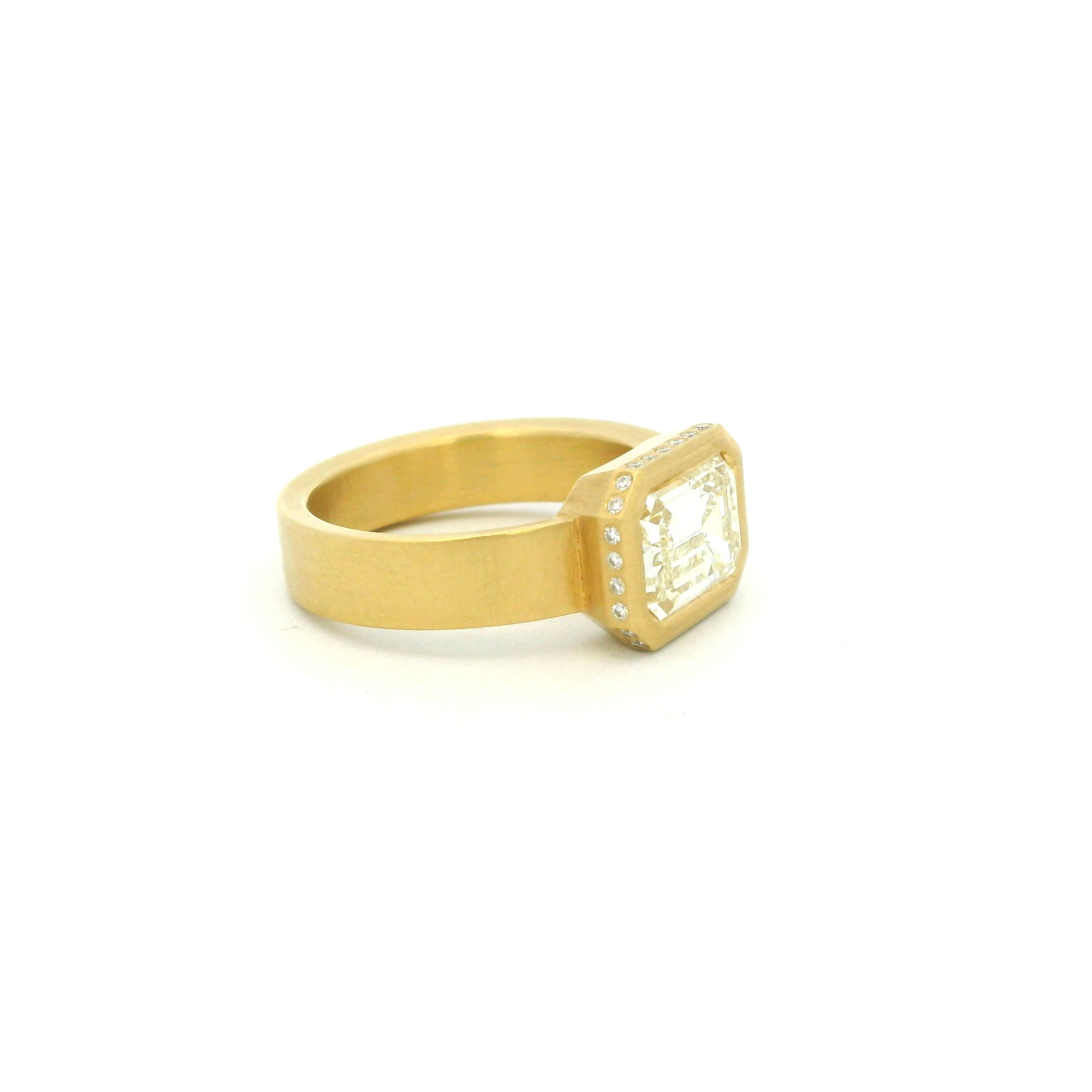 Yellow Gold and Emerald Cut Diamond RIng