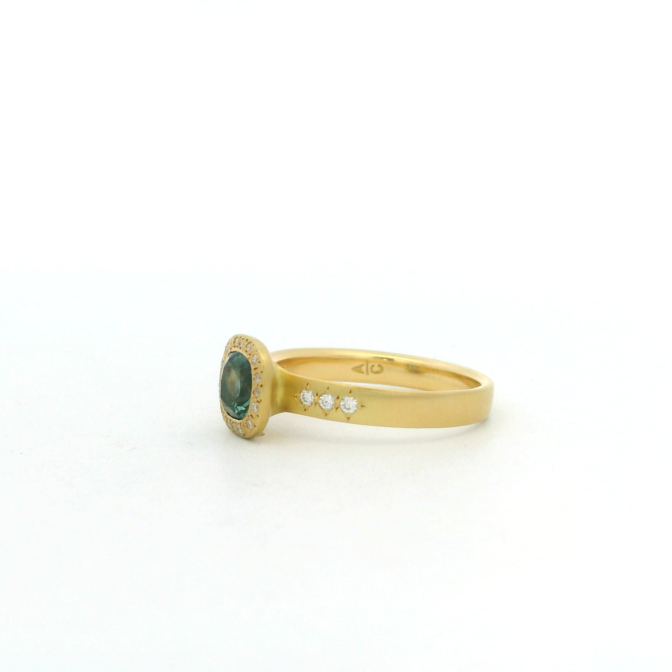 18 Karat Yellow Gold and Montana Sapphire Ring