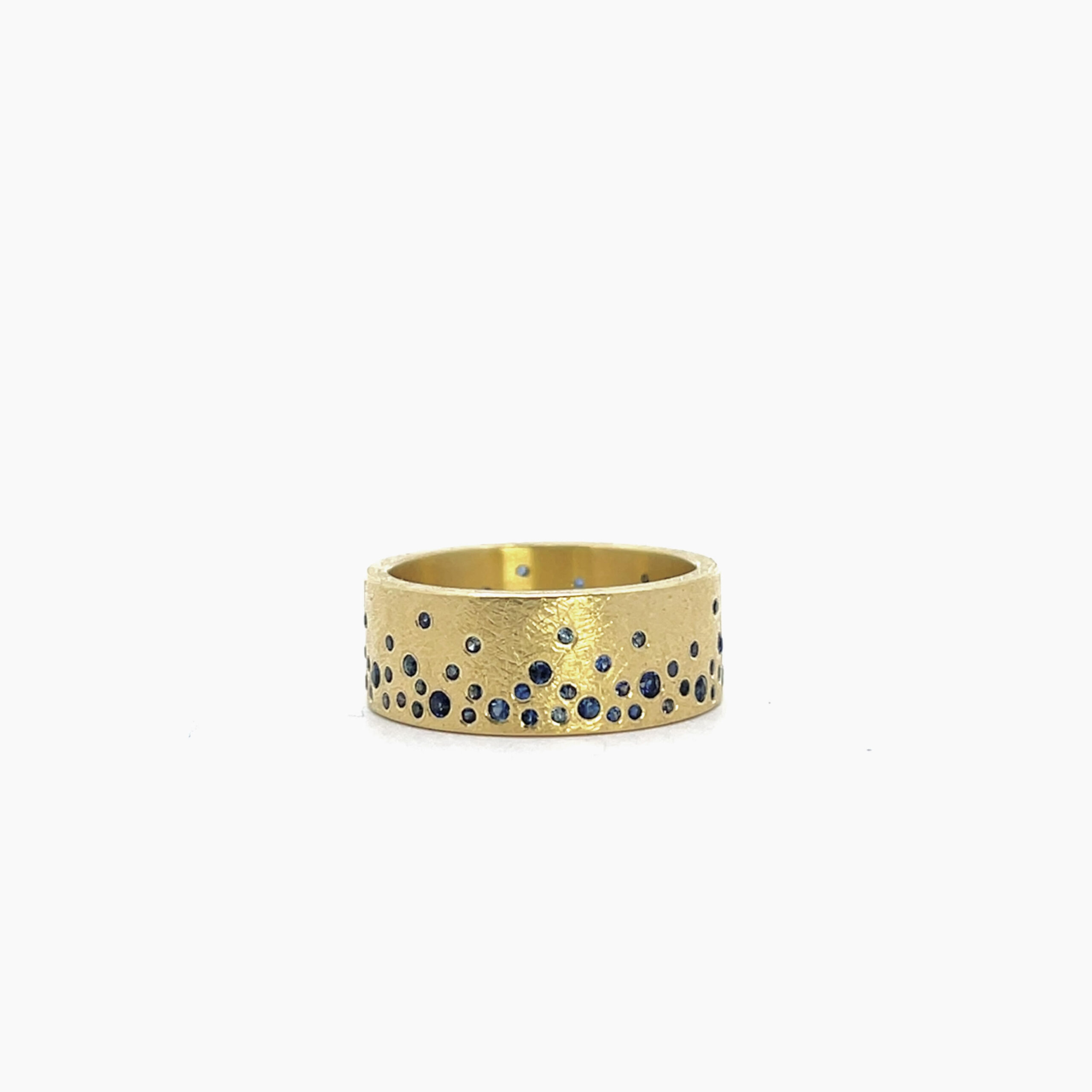 18 karat Yellow Gold and Scattered Sapphire Band