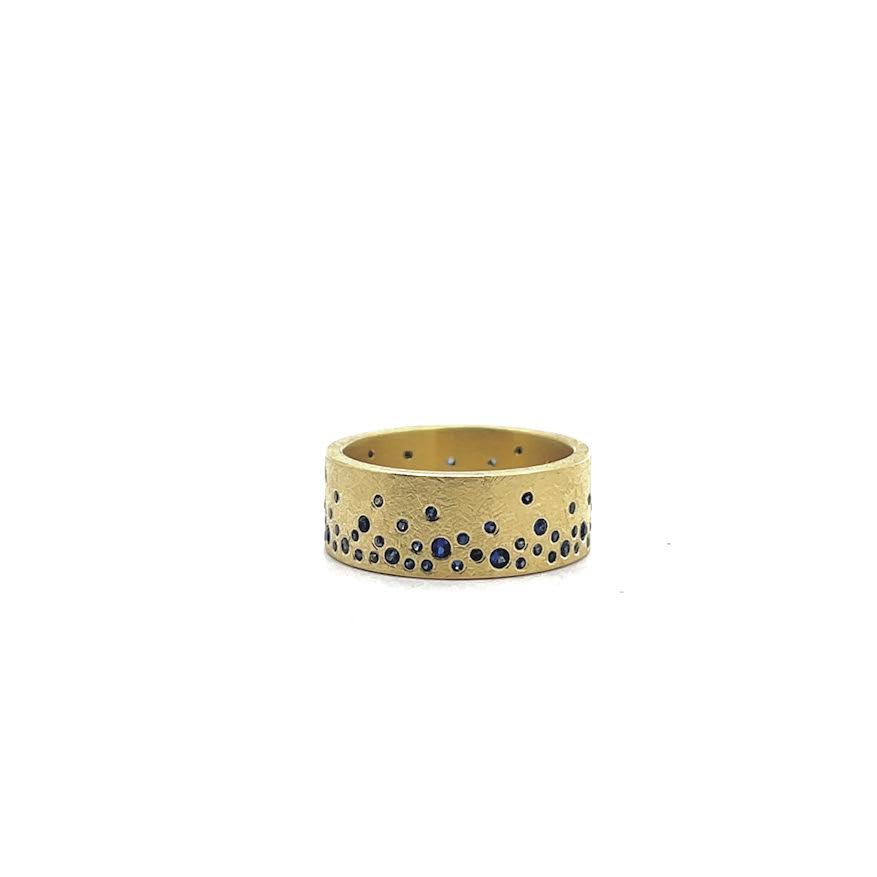 18 karat Yellow Gold and Scattered Sapphire Band